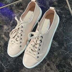 Worn a handful of times, ready to pass on.